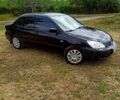 Чорний Міцубісі Lancer, об'ємом двигуна 1.6 л та пробігом 206 тис. км за 3400 $, фото 2 на Automoto.ua