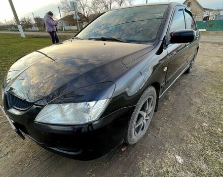 Чорний Міцубісі Lancer, об'ємом двигуна 2 л та пробігом 485 тис. км за 4500 $, фото 11 на Automoto.ua