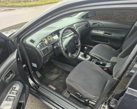 Черный Мицубиси Лансер, объемом двигателя 1.6 л и пробегом 280 тыс. км за 3200 $, фото 6 на Automoto.ua