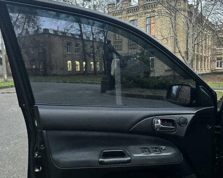 Чорний Міцубісі Lancer, об'ємом двигуна 2 л та пробігом 250 тис. км за 3999 $, фото 10 на Automoto.ua