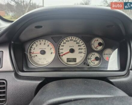 Черный Мицубиси Лансер, объемом двигателя 1.58 л и пробегом 280 тыс. км за 3200 $, фото 11 на Automoto.ua