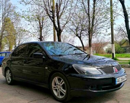 Чорний Міцубісі Lancer, об'ємом двигуна 2 л та пробігом 270 тис. км за 5700 $, фото 5 на Automoto.ua