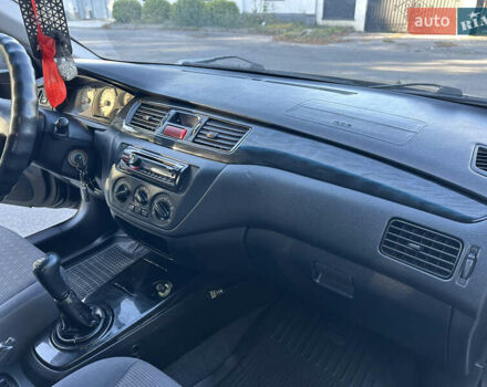 Мицубиси Лансер 2005 в Виннице на Automoto.ua Черный Мицубиси Лансер, объемом двигателя 1.6 л и пробегом 261 тыс. км за 4100 $, фото 52 на Automoto.ua