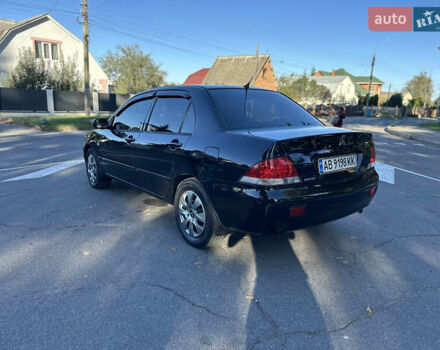 Мицубиси Лансер 2005 в Виннице на Automoto.ua Черный Мицубиси Лансер, объемом двигателя 1.6 л и пробегом 261 тыс. км за 4100 $, фото 29 на Automoto.ua