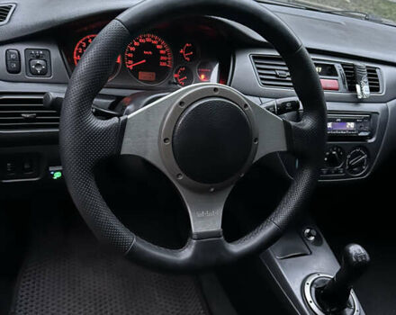 Чорний Міцубісі Lancer, об'ємом двигуна 2 л та пробігом 250 тис. км за 3999 $, фото 8 на Automoto.ua