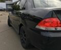 Черный Мицубиси Лансер, объемом двигателя 1.6 л и пробегом 250 тыс. км за 3100 $, фото 4 на Automoto.ua