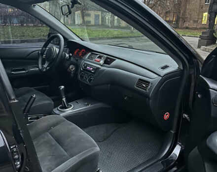 Чорний Міцубісі Lancer, об'ємом двигуна 2 л та пробігом 250 тис. км за 3999 $, фото 11 на Automoto.ua