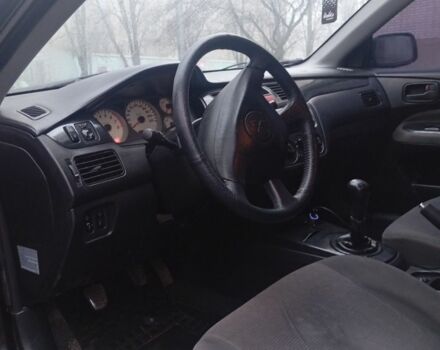 Чорний Міцубісі Lancer, об'ємом двигуна 1.6 л та пробігом 211 тис. км за 3700 $, фото 4 на Automoto.ua