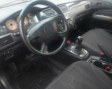 Чорний Міцубісі Lancer, об'ємом двигуна 1.58 л та пробігом 275 тис. км за 3100 $, фото 7 на Automoto.ua