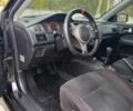 Черный Мицубиси Лансер, объемом двигателя 2 л и пробегом 225 тыс. км за 4750 $, фото 7 на Automoto.ua