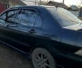 Чорний Міцубісі Lancer, об'ємом двигуна 2 л та пробігом 485 тис. км за 4500 $, фото 8 на Automoto.ua