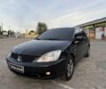 Чорний Міцубісі Lancer, об'ємом двигуна 1.6 л та пробігом 190 тис. км за 4006 $, фото 1 на Automoto.ua