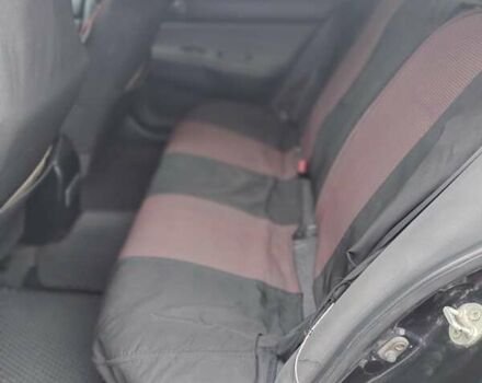 Міцубісі Lancer 2005 у Запоріжжя на Automoto.ua Чорний Міцубісі Lancer, об'ємом двигуна 1.58 л та пробігом 186 тис. км за 4700 $, фото 5 на Automoto.ua