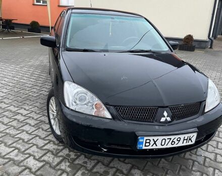 Черный Мицубиси Лансер, объемом двигателя 1.6 л и пробегом 240 тыс. км за 3499 $, фото 3 на Automoto.ua