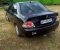 Чорний Міцубісі Lancer, об'ємом двигуна 1.6 л та пробігом 206 тис. км за 3400 $, фото 4 на Automoto.ua