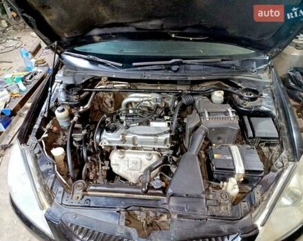 Чорний Міцубісі Lancer, об'ємом двигуна 1.58 л та пробігом 294 тис. км за 3800 $, фото 1 на Automoto.ua
