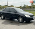 Чорний Міцубісі Lancer, об'ємом двигуна 1.58 л та пробігом 390 тис. км за 4500 $, фото 7 на Automoto.ua