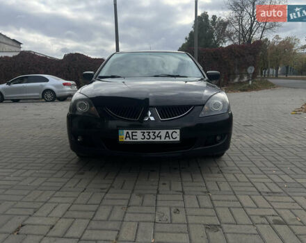 Чорний Міцубісі Lancer, об'ємом двигуна 1.58 л та пробігом 364 тис. км за 4000 $, фото 3 на Automoto.ua