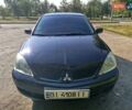 Чорний Міцубісі Lancer, об'ємом двигуна 1.6 л та пробігом 276 тис. км за 4000 $, фото 1 на Automoto.ua
