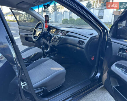 Мицубиси Лансер 2005 в Виннице на Automoto.ua Черный Мицубиси Лансер, объемом двигателя 1.6 л и пробегом 261 тыс. км за 4100 $, фото 50 на Automoto.ua