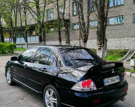 Чорний Міцубісі Lancer, об'ємом двигуна 2 л та пробігом 270 тис. км за 5700 $, фото 8 на Automoto.ua