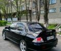 Чорний Міцубісі Lancer, об'ємом двигуна 2 л та пробігом 270 тис. км за 5700 $, фото 8 на Automoto.ua