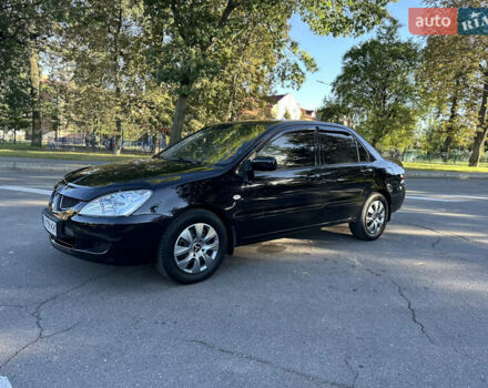 Мицубиси Лансер 2005 в Виннице на Automoto.ua Черный Мицубиси Лансер, объемом двигателя 1.6 л и пробегом 261 тыс. км за 4100 $, фото 28 на Automoto.ua