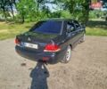 Чорний Міцубісі Lancer, об'ємом двигуна 1.6 л та пробігом 276 тис. км за 4000 $, фото 6 на Automoto.ua