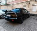 Чорний Міцубісі Lancer, об'ємом двигуна 2 л та пробігом 261 тис. км за 2700 $, фото 3 на Automoto.ua