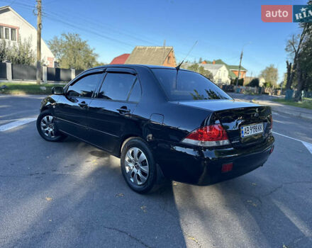 Мицубиси Лансер 2005 в Виннице на Automoto.ua Черный Мицубиси Лансер, объемом двигателя 1.6 л и пробегом 261 тыс. км за 4100 $, фото 24 на Automoto.ua