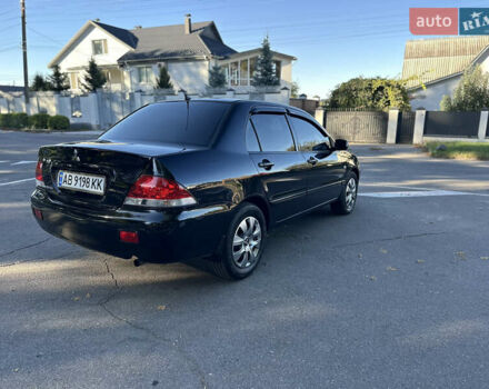 Мицубиси Лансер 2005 в Виннице на Automoto.ua Черный Мицубиси Лансер, объемом двигателя 1.6 л и пробегом 261 тыс. км за 4100 $, фото 30 на Automoto.ua