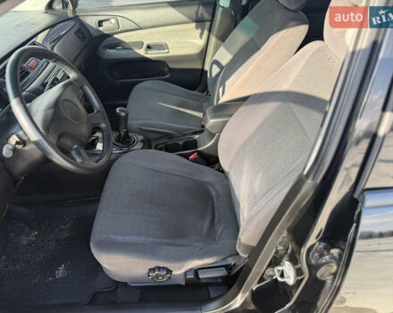 Чорний Міцубісі Lancer, об'ємом двигуна 1.6 л та пробігом 205 тис. км за 3650 $, фото 8 на Automoto.ua