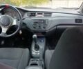 Черный Мицубиси Лансер, объемом двигателя 2 л и пробегом 225 тыс. км за 4400 $, фото 10 на Automoto.ua