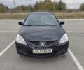 Міцубісі Lancer 2005 у Запоріжжя на Automoto.ua Чорний Міцубісі Lancer, об'ємом двигуна 1.58 л та пробігом 186 тис. км за 4700 $, фото 1 на Automoto.ua