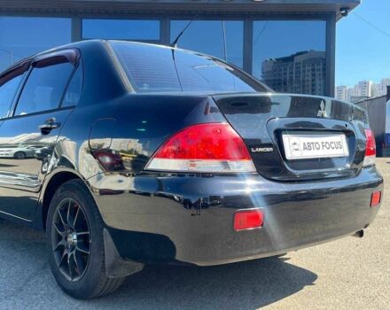 Чорний Міцубісі Lancer, об'ємом двигуна 2 л та пробігом 310 тис. км за 4990 $, фото 5 на Automoto.ua