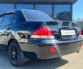 Чорний Міцубісі Lancer, об'ємом двигуна 2 л та пробігом 310 тис. км за 4990 $, фото 5 на Automoto.ua