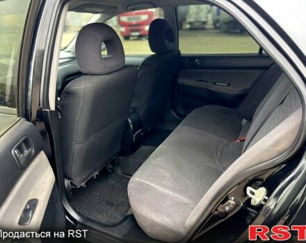Чорний Міцубісі Lancer, об'ємом двигуна 1.6 л та пробігом 250 тис. км за 3700 $, фото 11 на Automoto.ua