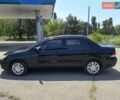 Черный Мицубиси Лансер, объемом двигателя 1.58 л и пробегом 352 тыс. км за 4000 $, фото 1 на Automoto.ua