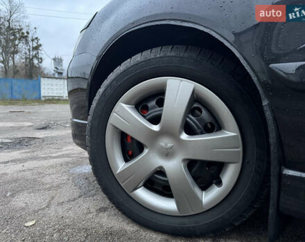 Черный Мицубиси Лансер, объемом двигателя 1.58 л и пробегом 154 тыс. км за 5500 $, фото 41 на Automoto.ua