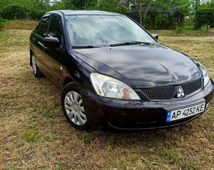 Чорний Міцубісі Lancer, об'ємом двигуна 1.6 л та пробігом 206 тис. км за 3400 $, фото 1 на Automoto.ua