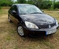 Чорний Міцубісі Lancer, об'ємом двигуна 1.6 л та пробігом 206 тис. км за 3400 $, фото 1 на Automoto.ua