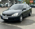 Чорний Міцубісі Lancer, об'ємом двигуна 1.58 л та пробігом 390 тис. км за 4500 $, фото 3 на Automoto.ua