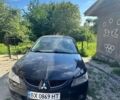 Чорний Міцубісі Lancer, об'ємом двигуна 1.58 л та пробігом 411 тис. км за 1000 $, фото 1 на Automoto.ua