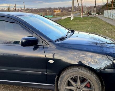 Чорний Міцубісі Lancer, об'ємом двигуна 2 л та пробігом 485 тис. км за 4500 $, фото 3 на Automoto.ua