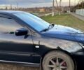 Чорний Міцубісі Lancer, об'ємом двигуна 2 л та пробігом 485 тис. км за 4500 $, фото 3 на Automoto.ua