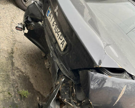 Черный Мицубиси Лансер, объемом двигателя 1.58 л и пробегом 360 тыс. км за 1500 $, фото 4 на Automoto.ua