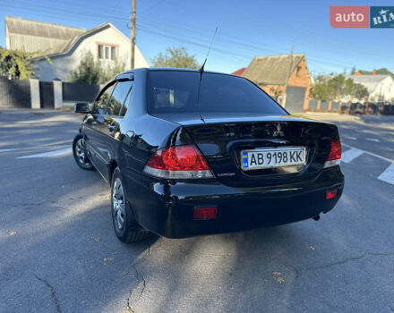 Мицубиси Лансер 2005 в Виннице на Automoto.ua Черный Мицубиси Лансер, объемом двигателя 1.6 л и пробегом 261 тыс. км за 4100 $, фото 23 на Automoto.ua