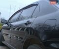 Чорний Міцубісі Lancer, об'ємом двигуна 1.58 л та пробігом 263 тис. км за 4500 $, фото 13 на Automoto.ua