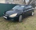 Чорний Міцубісі Lancer, об'ємом двигуна 1.58 л та пробігом 279 тис. км за 4000 $, фото 1 на Automoto.ua