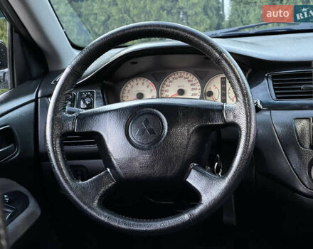 Мицубиси Лансер 2005 в Черкассах на Automoto.ua Черный Мицубиси Лансер, объемом двигателя 1.58 л и пробегом 368 тыс. км за 4400 $, фото 31 на Automoto.ua
